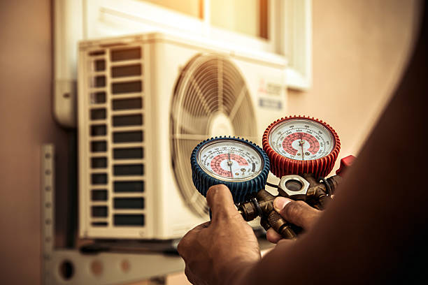 Professional Ductwork Repair technician working in Aquebogue, NY